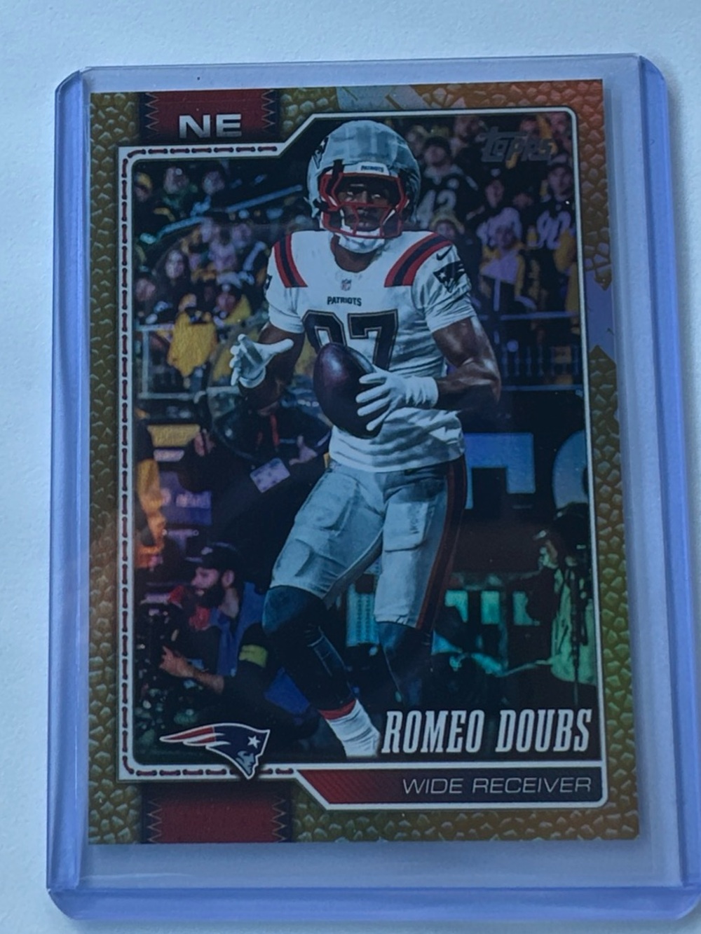 Romeo Doubs Topps Football card Patriots 1st season. Parallel. Number 7/50
